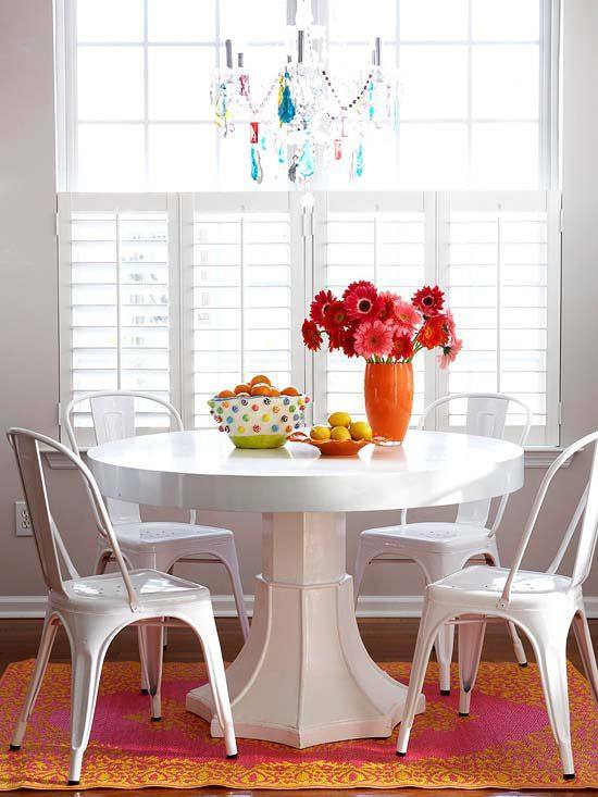 White dining room with splashes of color White dining room with splashes of color