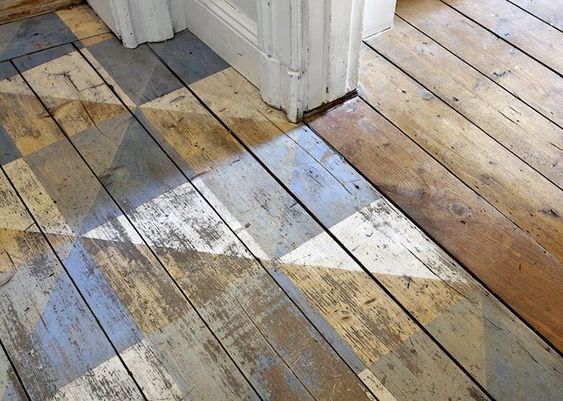 Painted wood floor that renovates a space
